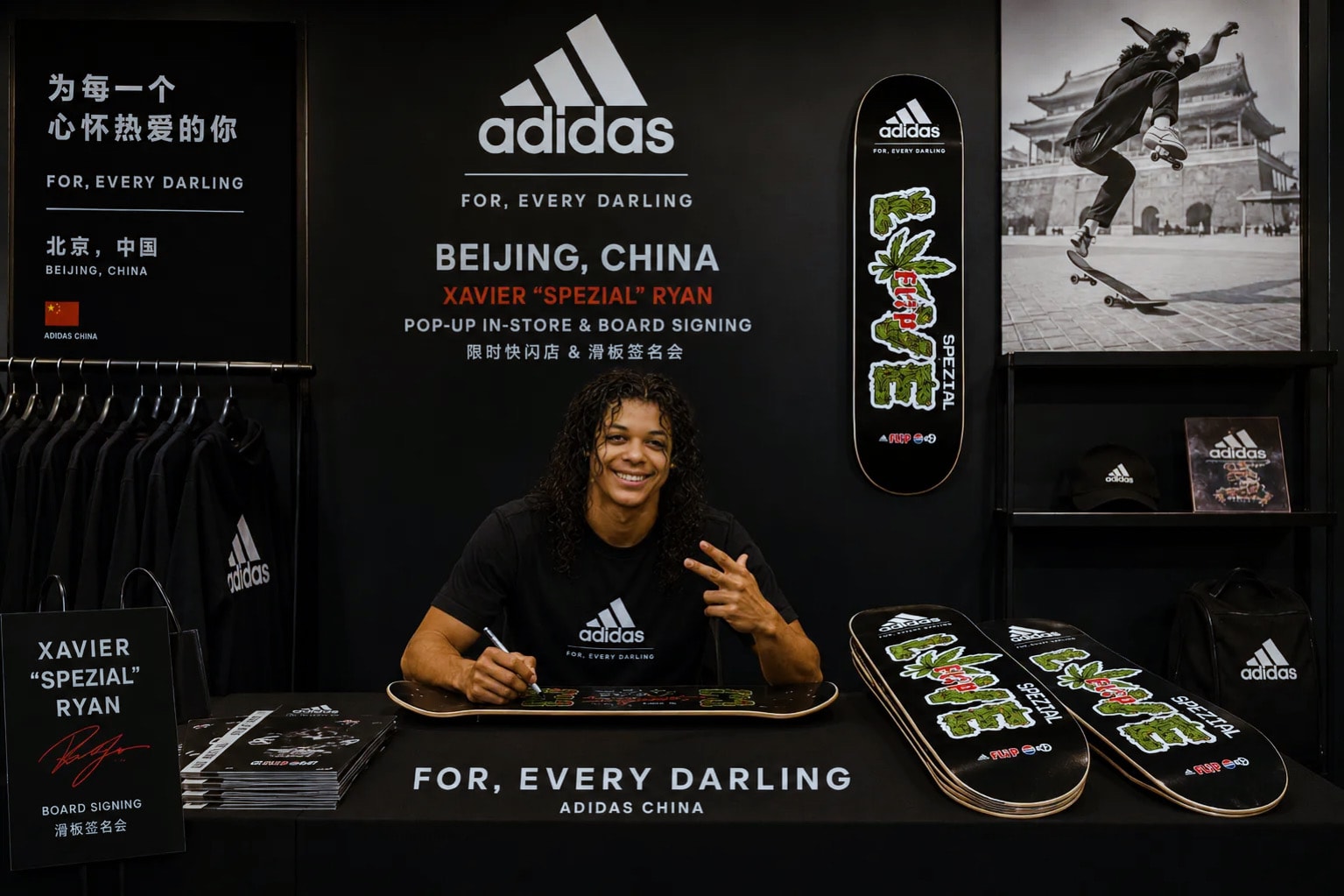 Xavier Ryan at an adidas board-signing event in Beijing with Spezial collaboration skateboards