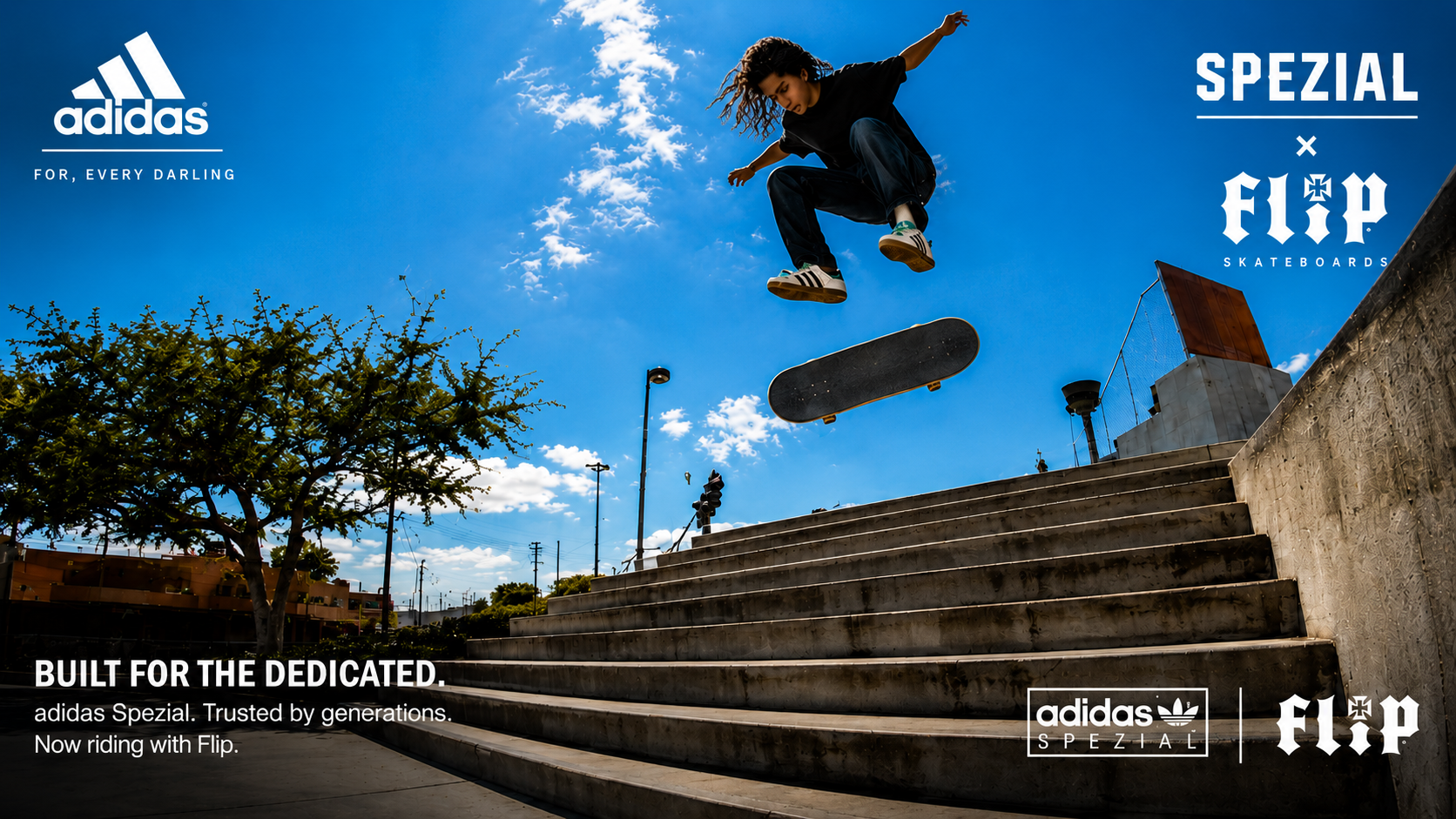 Colour campaign image of Xavier Ryan flipping his skateboard over a stair set